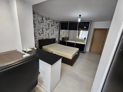 inchiriere apartament Sector 3 Bucuresti dormitor cu pat si birou